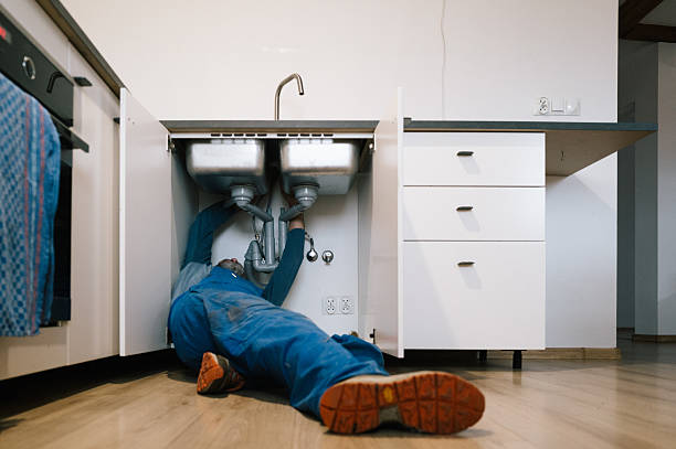 Professional Emergency Plumber technician working in Laurel, MS